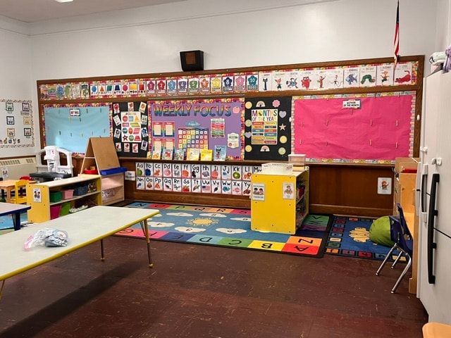 Curé of Ars classroom with Weekly Focus bulletin board