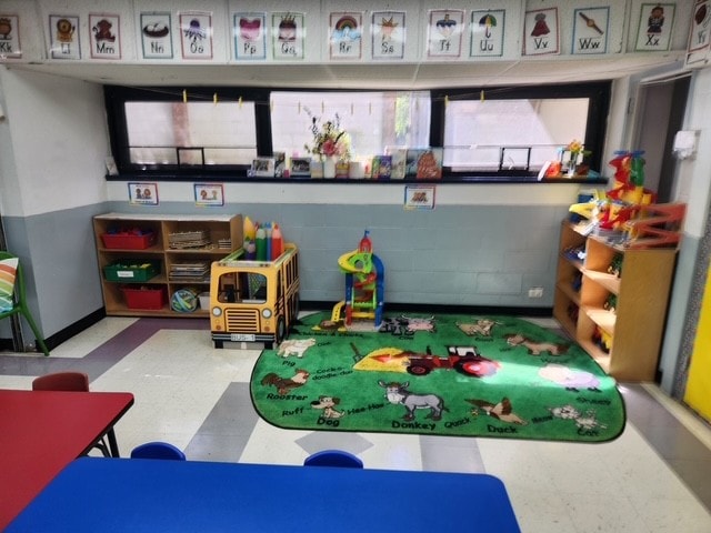 Merrick preschool classroom with learning play area
